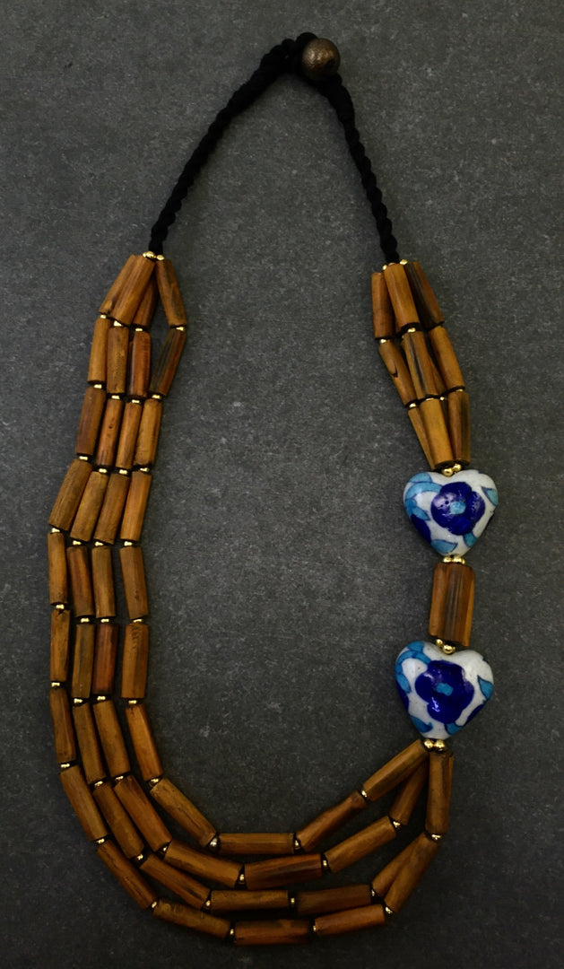HORN PIPE & CERAMIC BEAD WITH GOLD METAL BOLL & THREAD BRAIDED NECKLACE