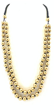 NK15112A - PLASTIC BEAD WITH BRAIDED THREAD NECKLACE