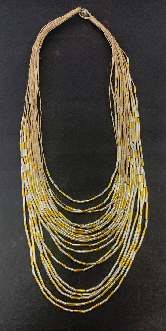NK15726 - MULTY LAYERED JUTE DORI WITH BRASS PIPE NECKLACE