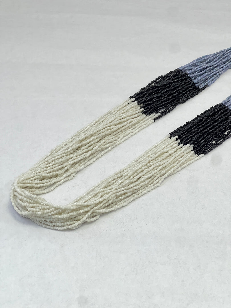 STRING WHITE, BLACK, BLUE SEED BEAD NECKLACE