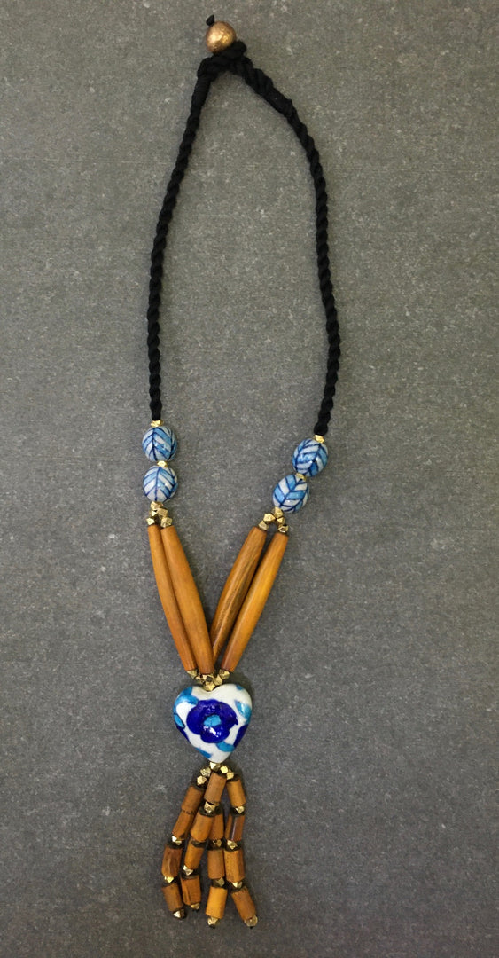 HORN PIPE & CEREMIC BEAD WITH GOLD METAL BOLL & THREAD BRAIDED NECKLACE